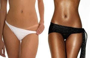 two women in swimwear wearing spray tan